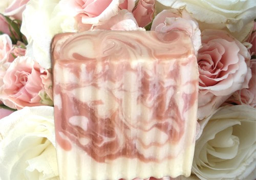 This Rose Butter bar is a lighter, fresher, pinker rose. It smells like petite baby roses and has all the benefits that come with raw shea butter! It is a corporate rose that's not too sweet and not too mature. She's just right! California Handmade Soaps